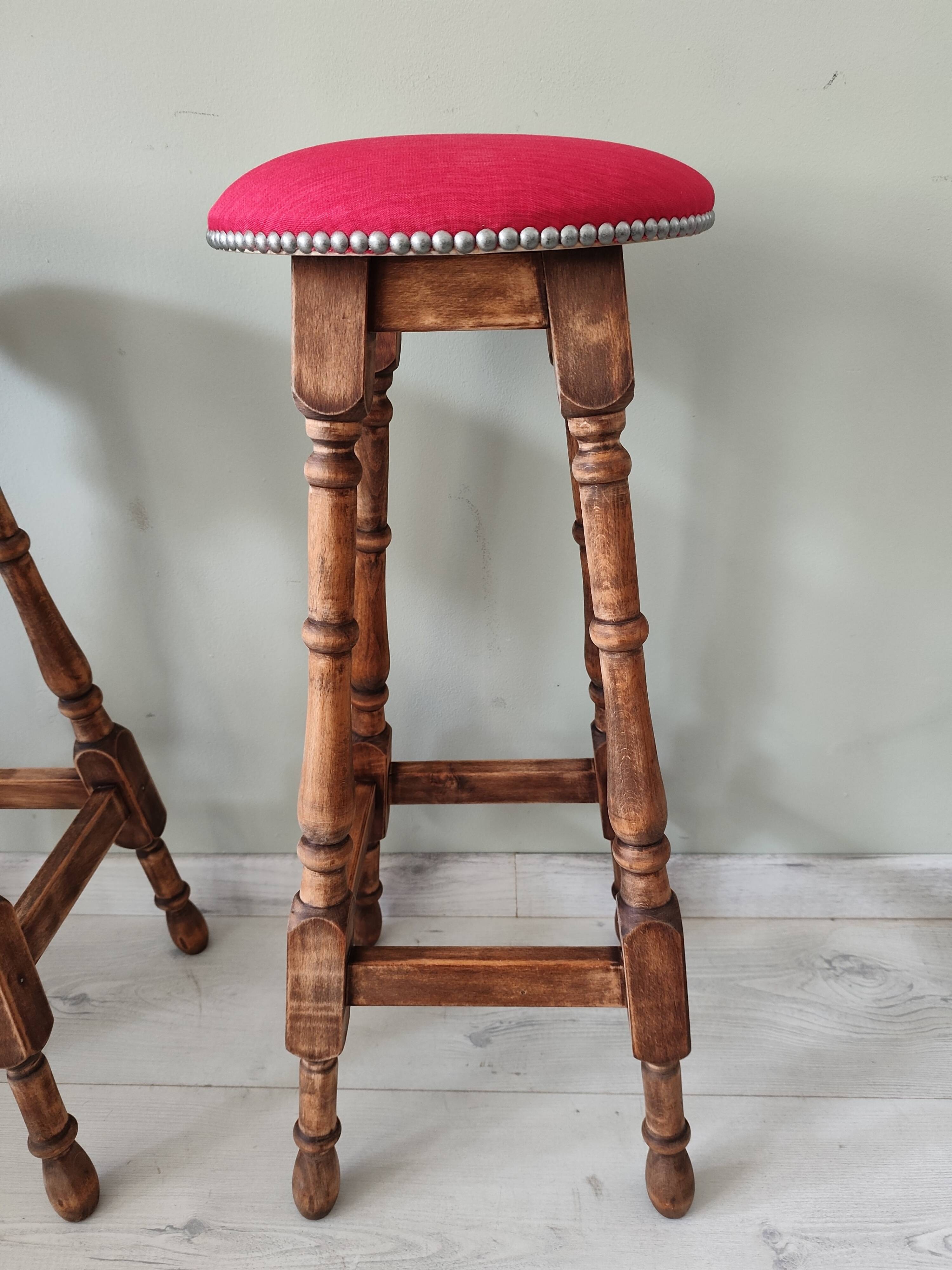Pair of antique high stools in solid wood