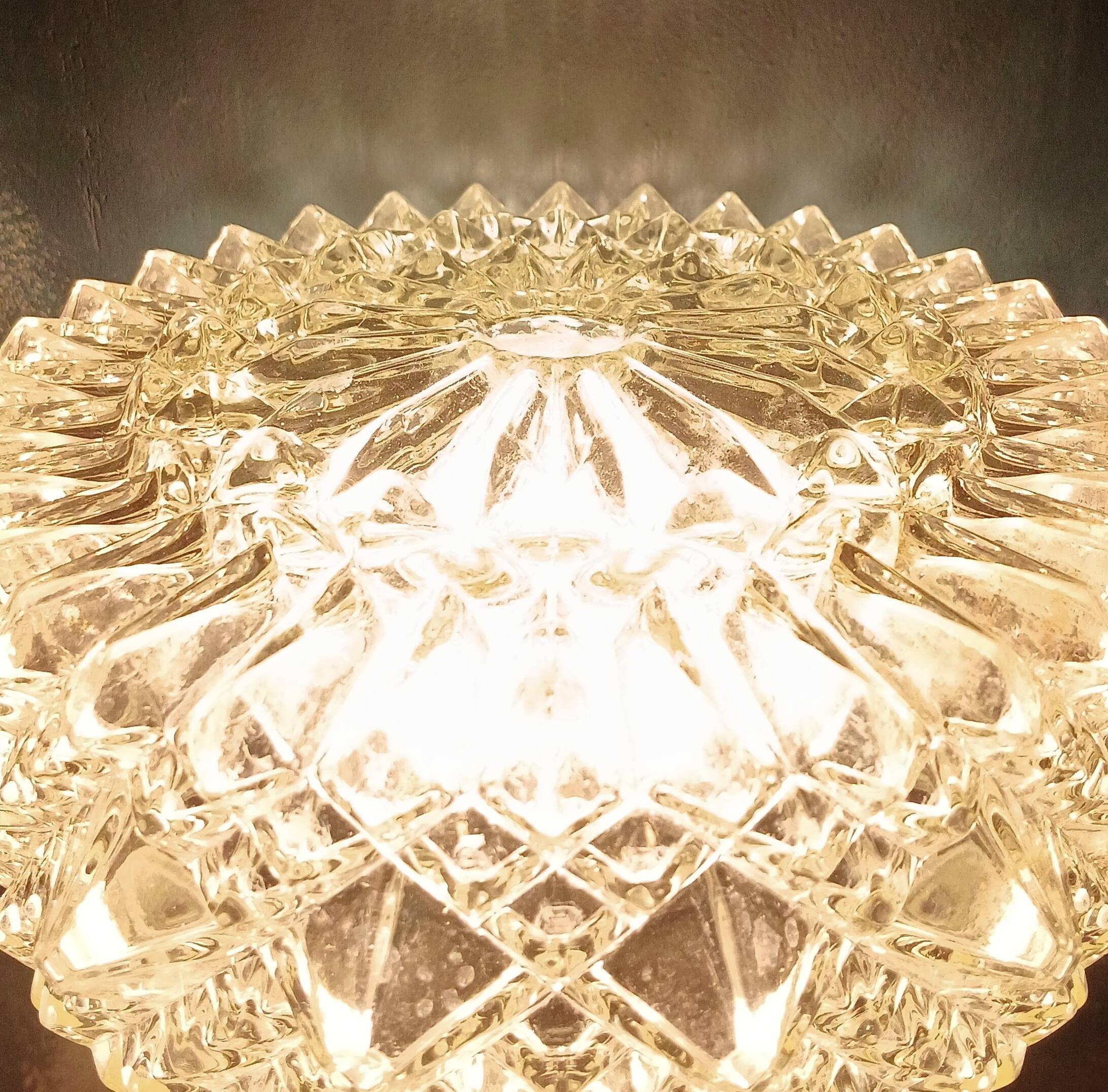 Ceiling light or wall light in moulded glass with diamond point, 1970.