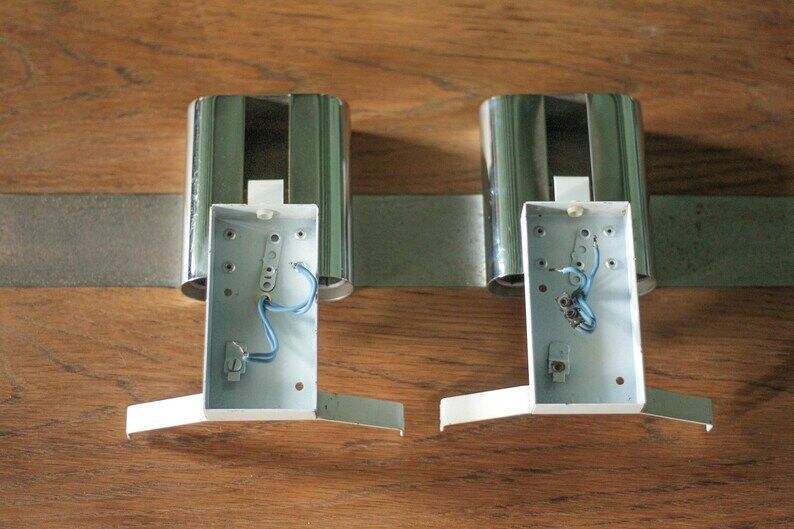 Pair of chrome wall sconces with Murano glass, wall light, art of glass, interior decoration.