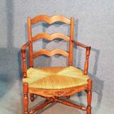 Old straw armchair