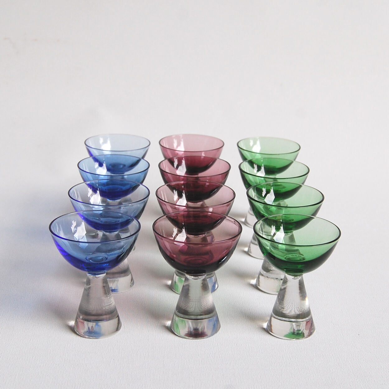 Set of 12 alcohol glasses in colored glass 1950s