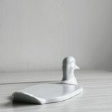 White porcelain dish in the shape of a duck.