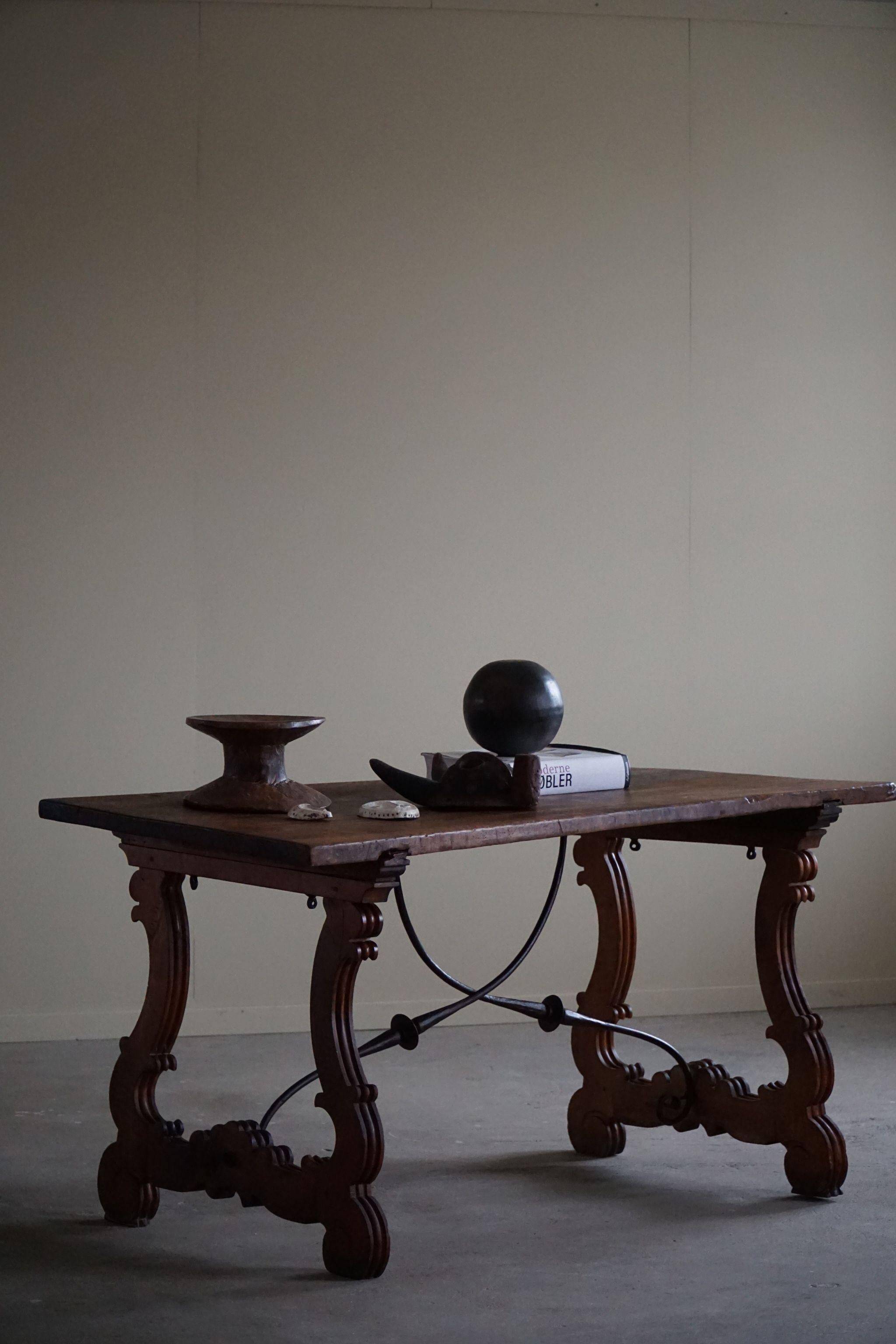 Brutalist table in antique Spanish solid oak and wrought iron, 19th century.