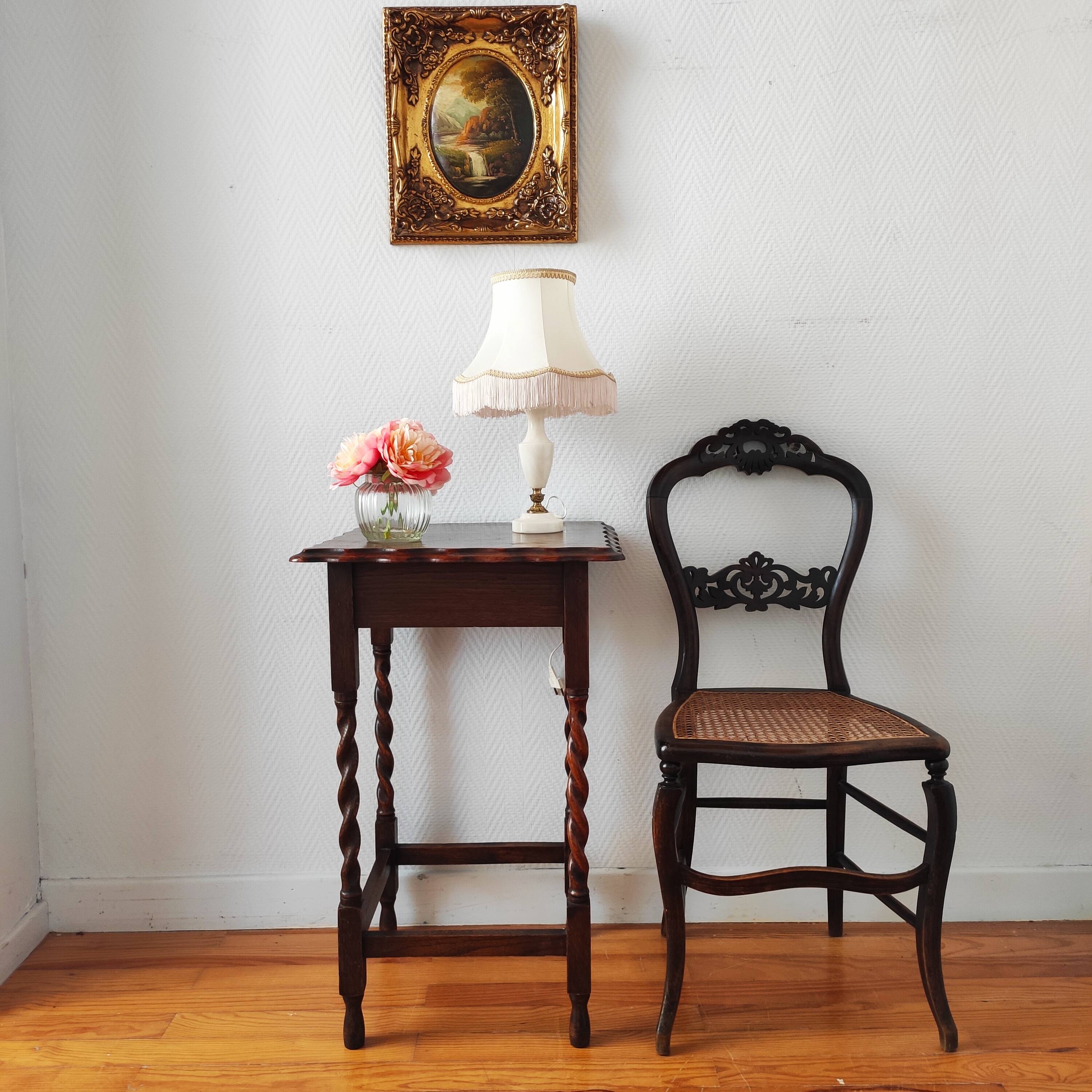 Antique solid oak side table with turned wooden legs.