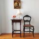 Antique solid oak side table with turned wooden legs.