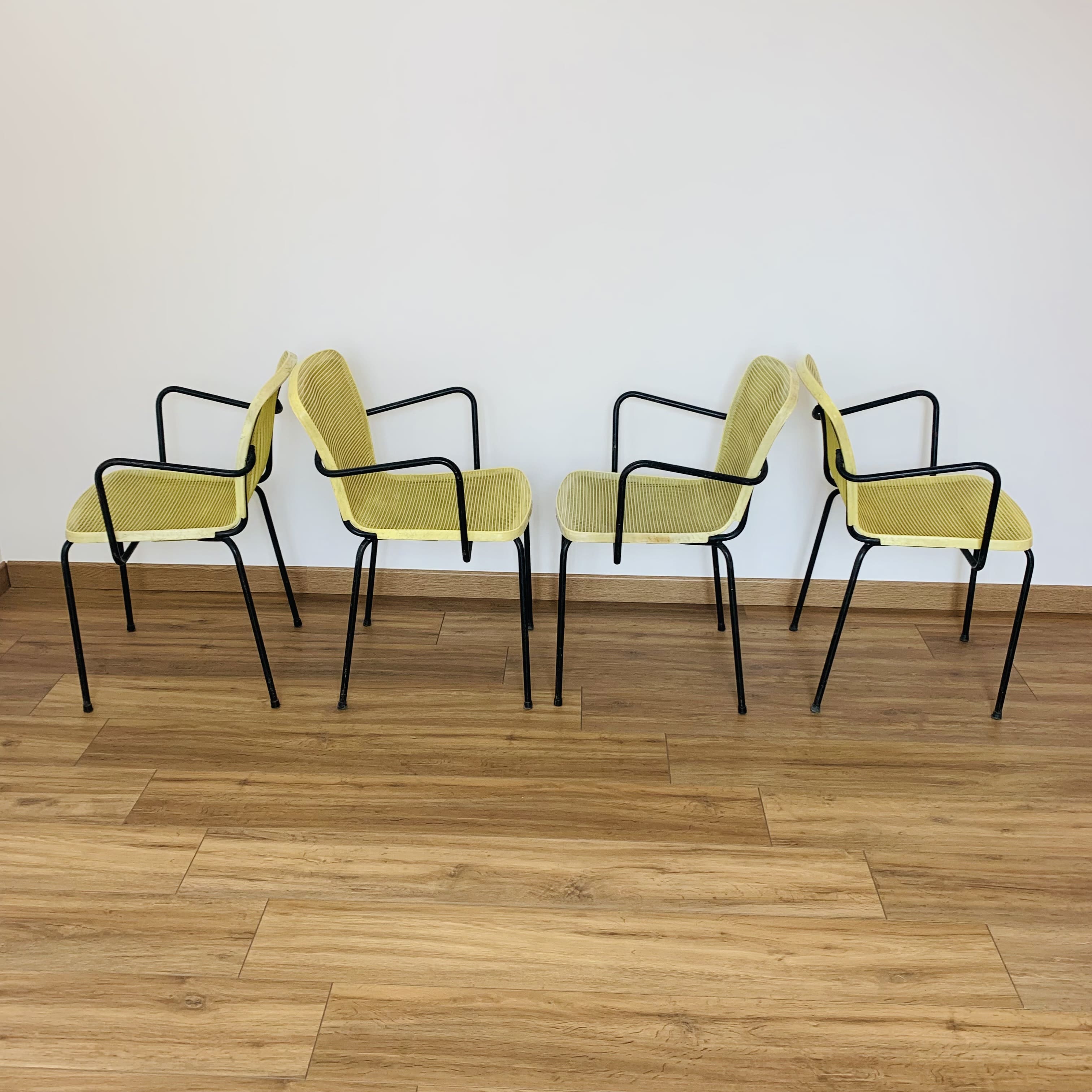 4 yellow outdoor armchairs