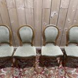 Suite de 4 chaises style Louis XVI "Fer à cheval"