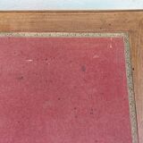 Old wooden desk, red felt top