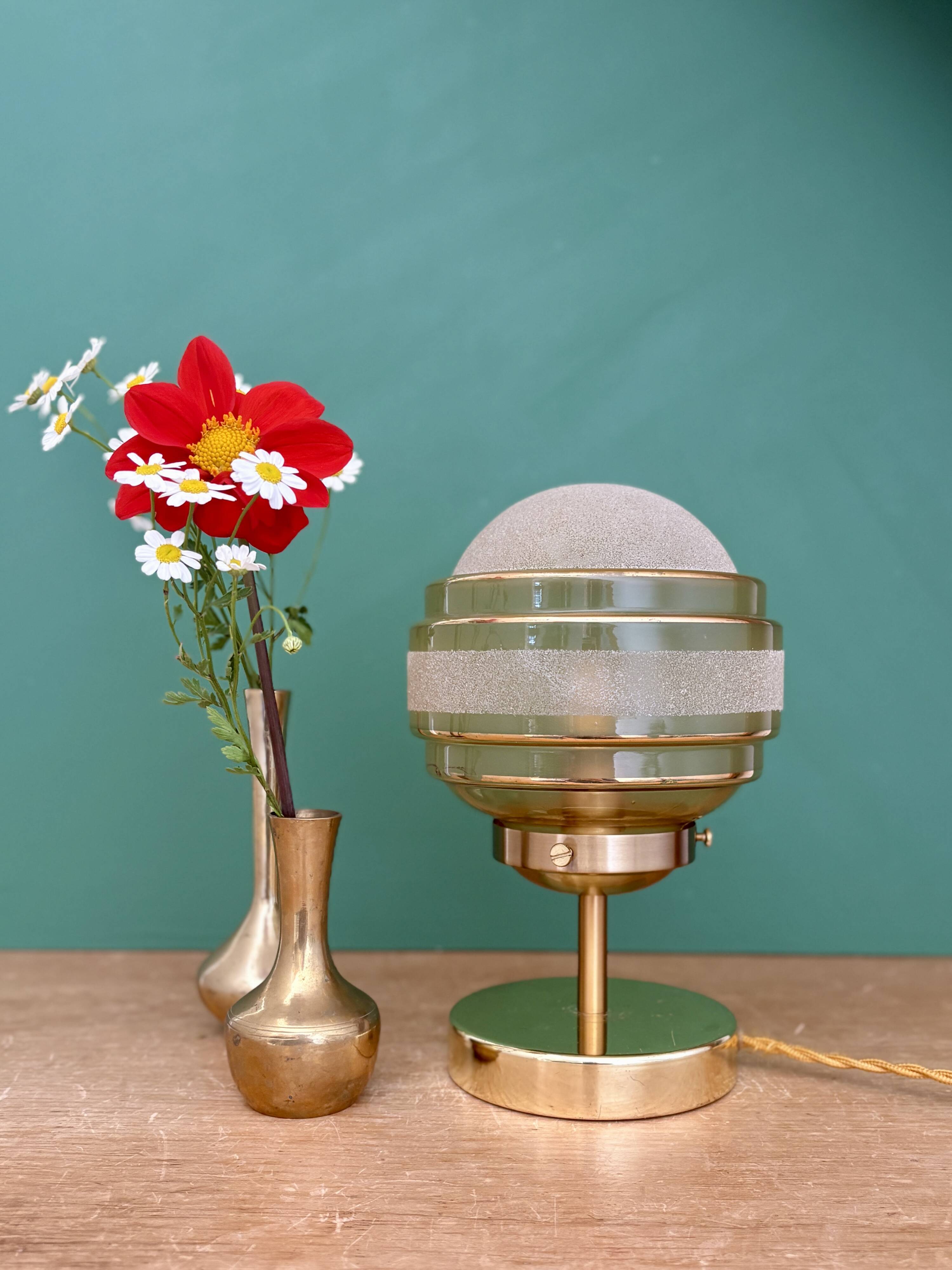 Vintage globe table lamp in frosted yellow and gold glass.