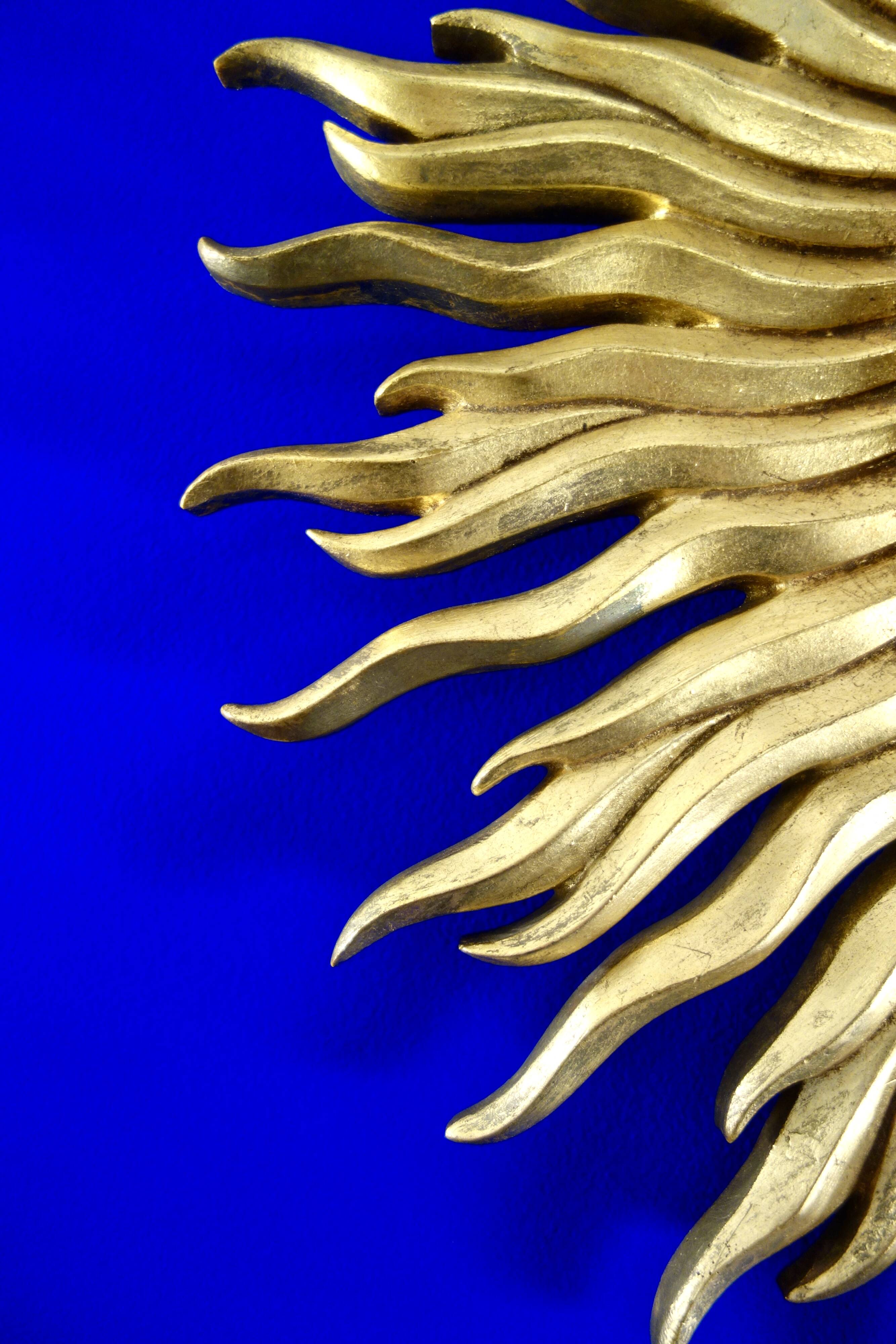 Vintage convex sun mirror in gilded wood, France 1960's