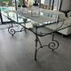 Roche Bobois glass and steel dining table and 6 chairs