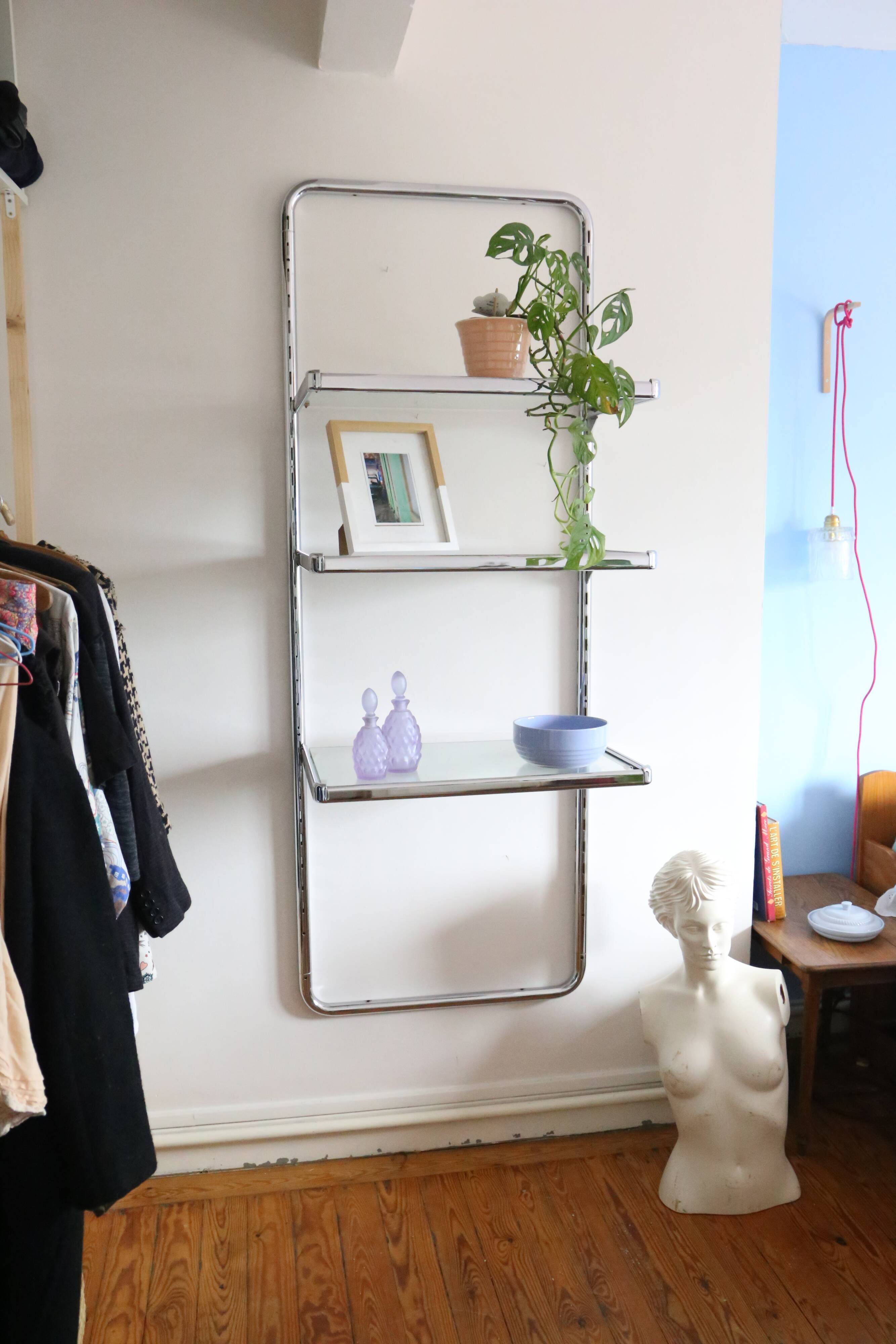 Chrome and glass wall shelf, circa 1960