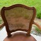 Cane and leather armchair in Louis XV style
