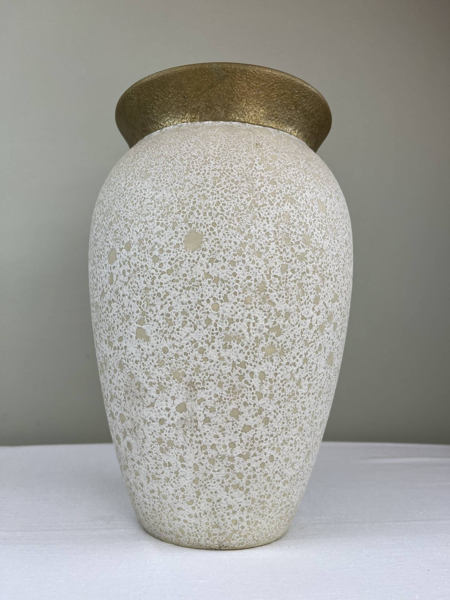 Cream speckled glazed vase with a gold rim, 1970s.