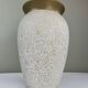 Cream speckled glazed vase with a gold rim, 1970s.