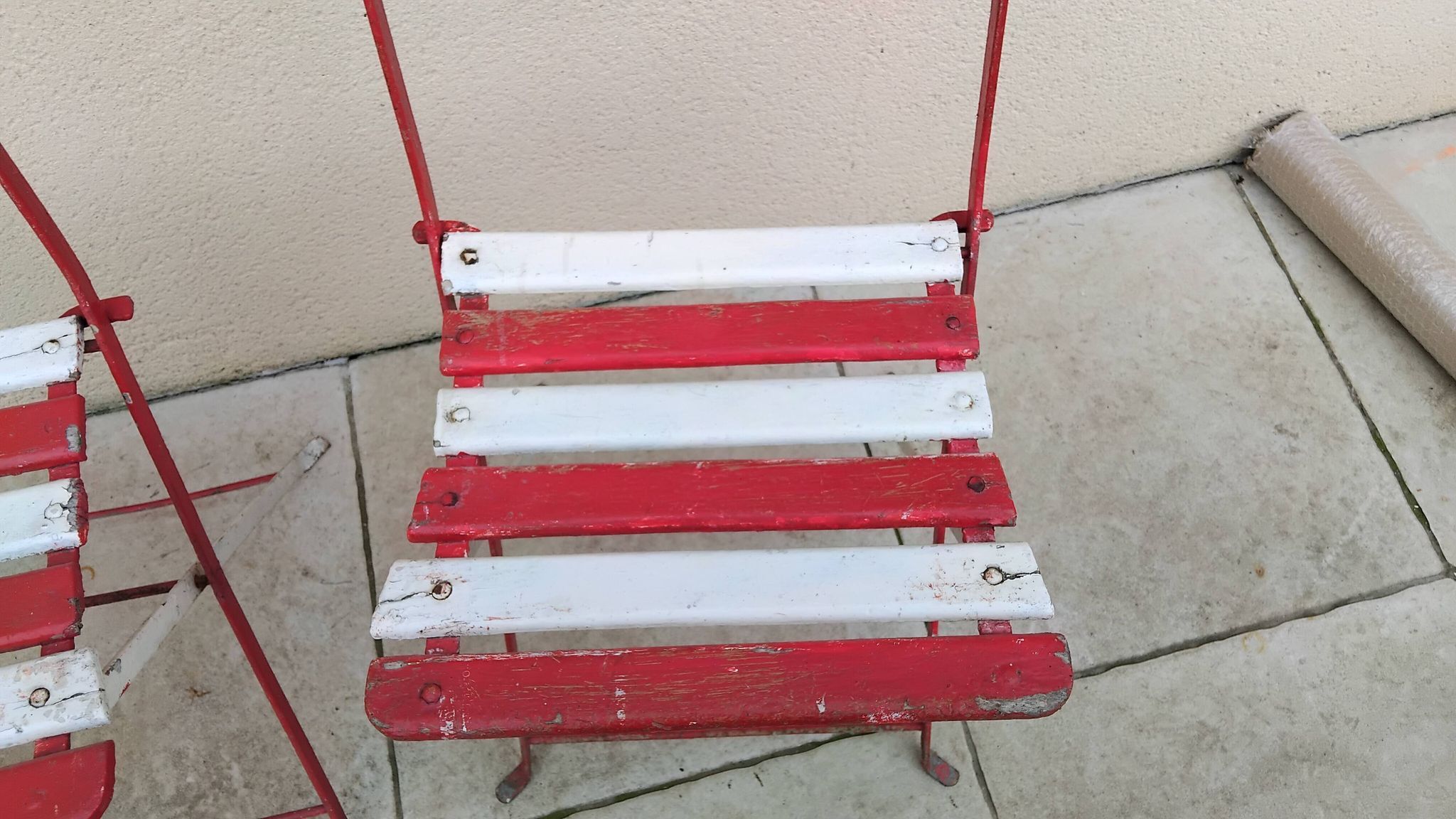 Pair of antique 1900s folding garden bistro chairs
