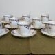 18-piece porcelain coffee set signed "Aux Lions de Faïence Paris"