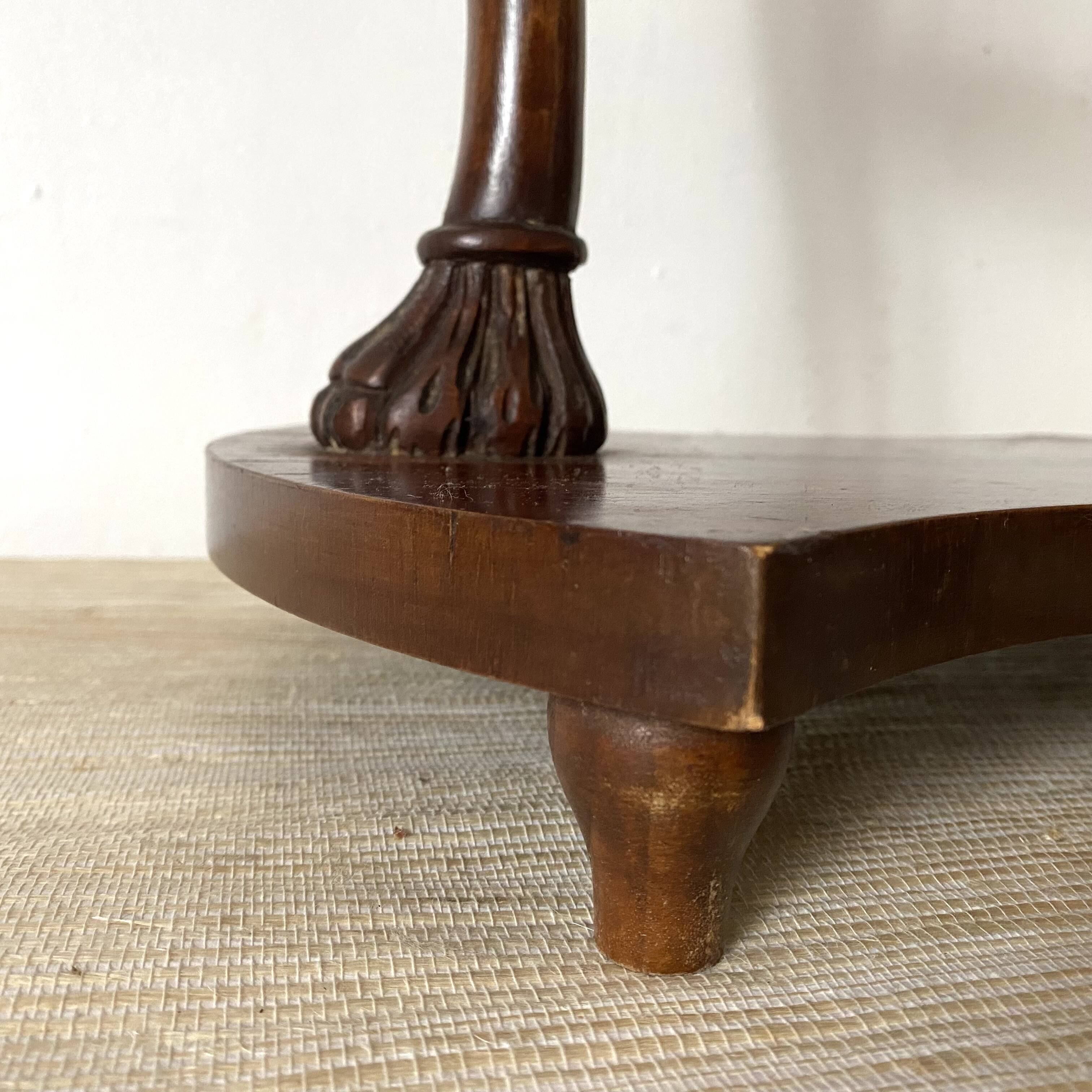 Empire style swan neck and lion paw pedestal table