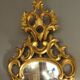 Carved and gilded wooden mirror with gold leaf 46 x 103 cm