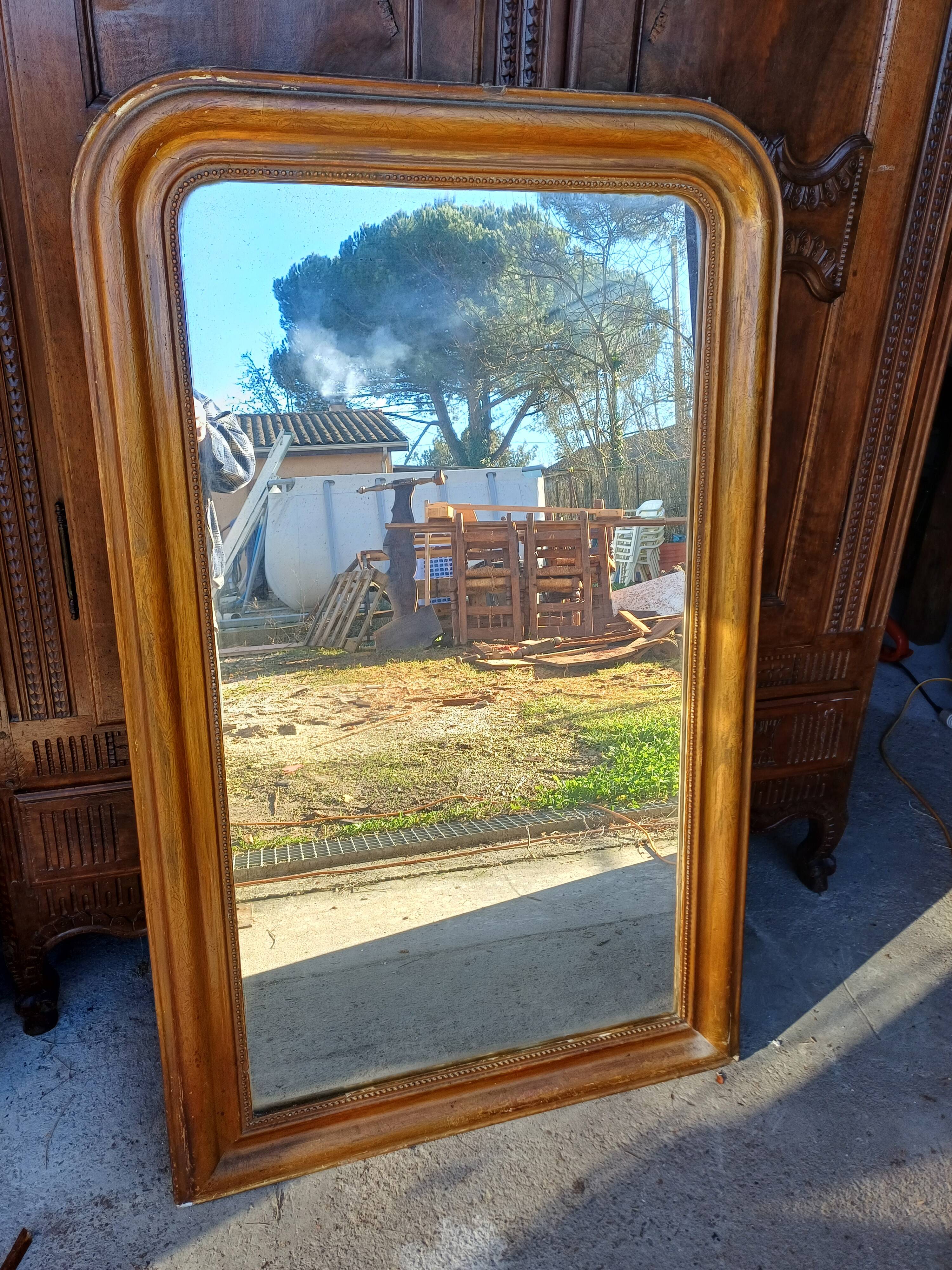Napoleon III mirror in wood and gilded stucco