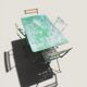 Bistro tables and folding chairs with a patina from the original 1930s.