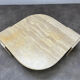 Table basse travertin forme œil par Roche Bobois