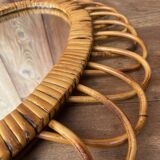 Vintage oval rattan mirror from the 60s/70s.