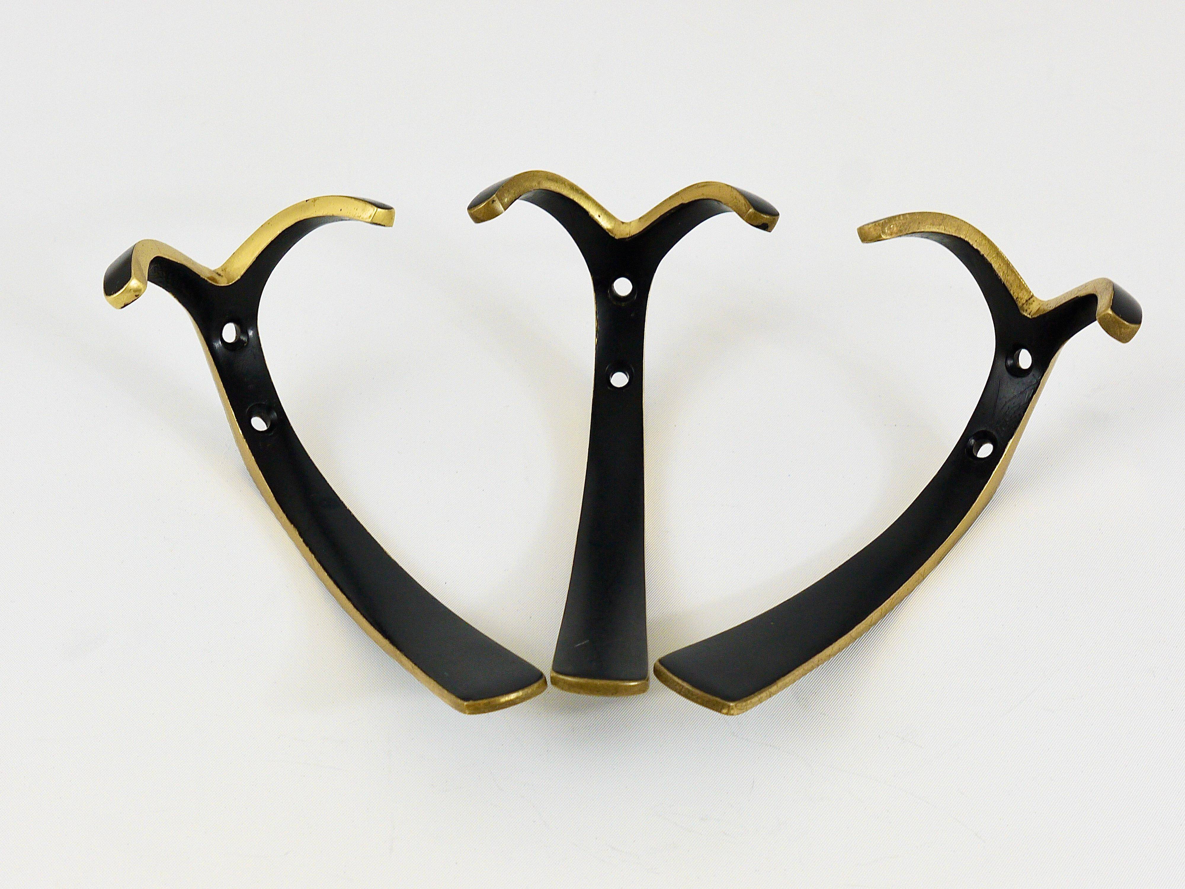 Up to 2 double wall hooks in brass from the mid-century by Herta Baller, Austria, 1950s.