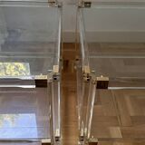 2 side tables in plexiglass, glass, and brass.