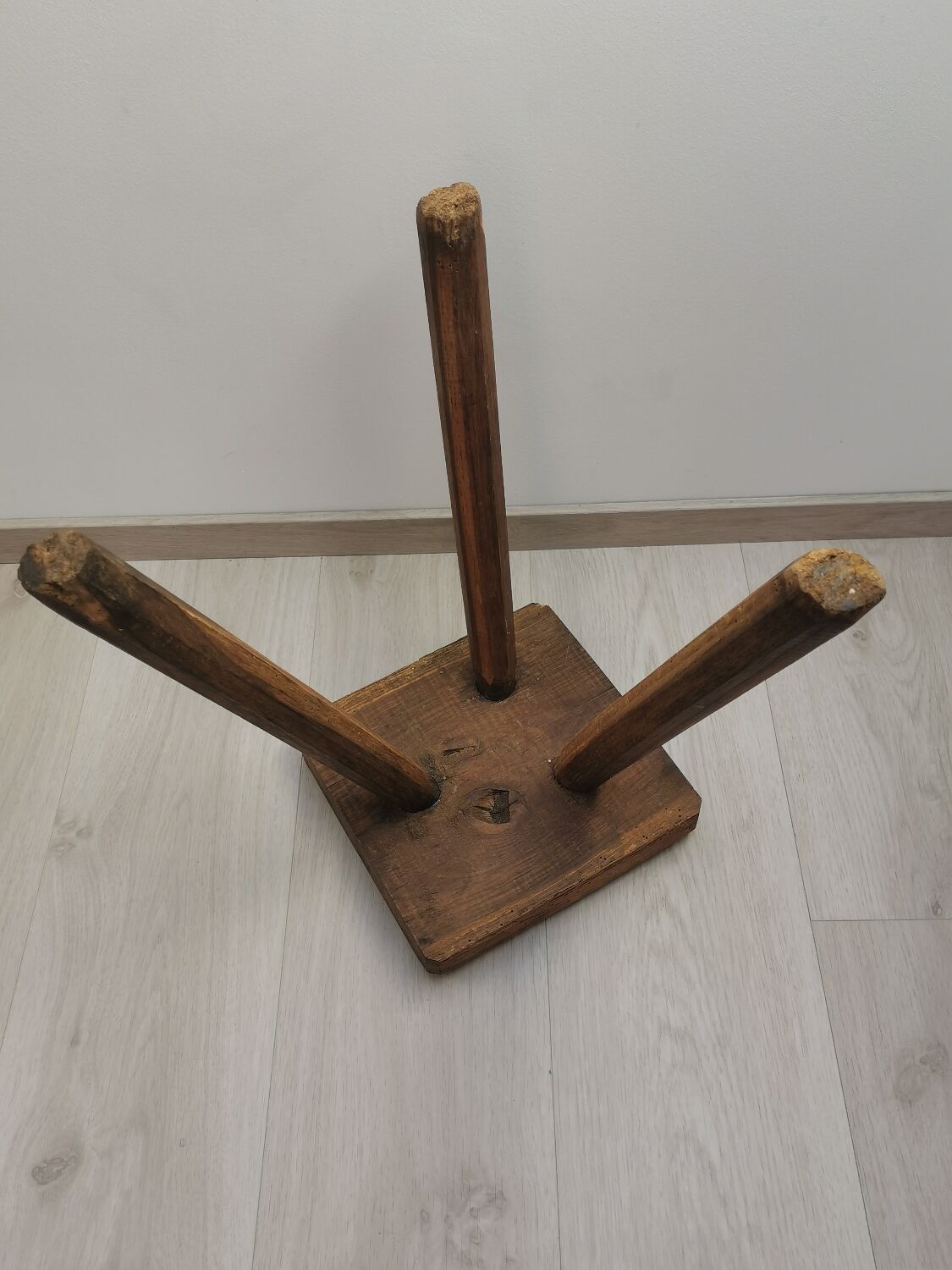 Old wooden stool tripods