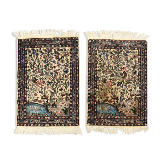 Pair of carpets decorated with rabbits and ducks in a wood