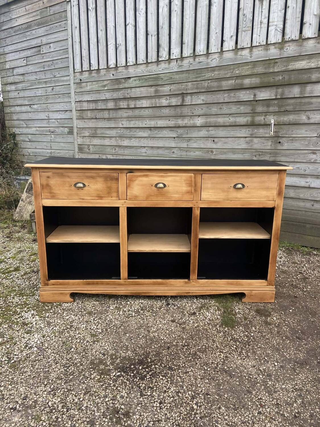 Raw wooden buffet without doors