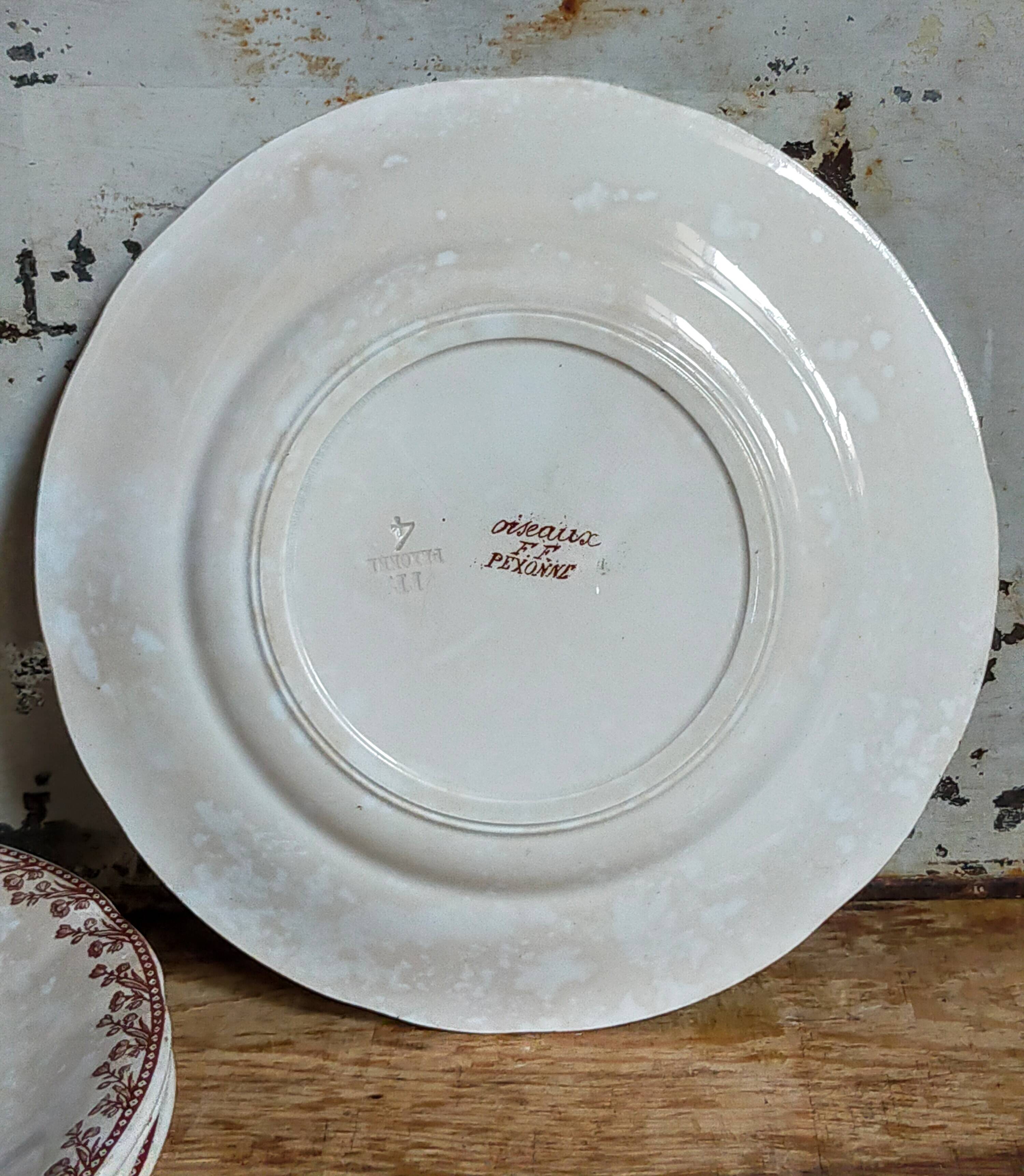 Seven iron earth dessert plates with birds ffPexonne late 19th century