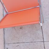 Vintage chrome and orange magazine rack from the 70s and 80s