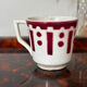 Set of two antique opaque porcelain cups from Gien.