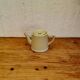 Vintage pastel yellow teapot