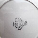 Set of 7 Betty Longwy model plates with floral decoration