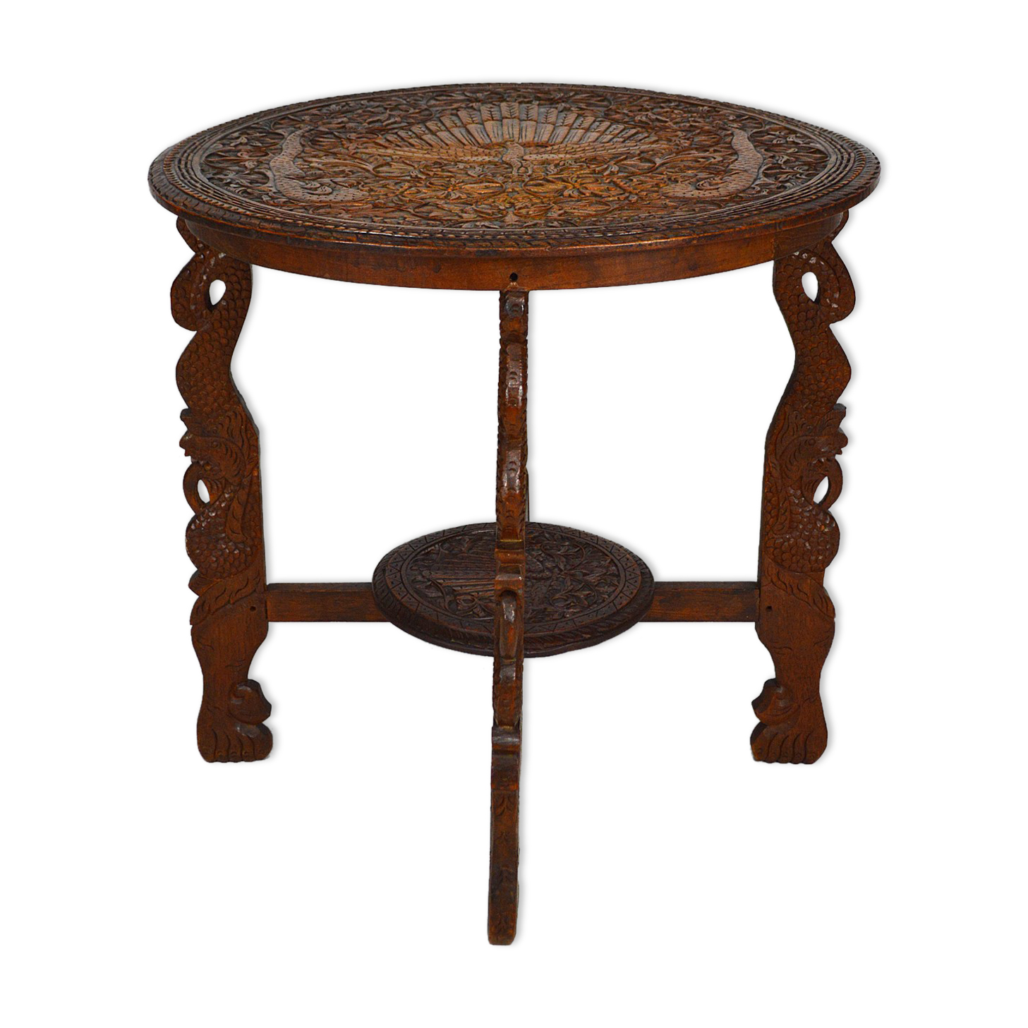 Asian coffee table carved with dragons and peacocks, Indonesia, early 20th century