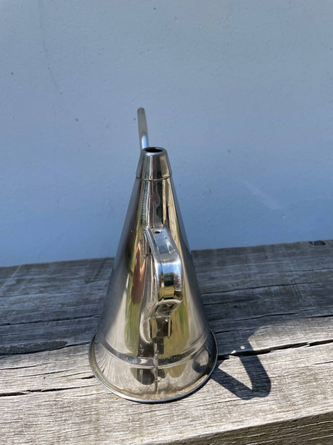 Small stainless steel watering can