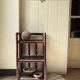 dark brown bamboo shelf