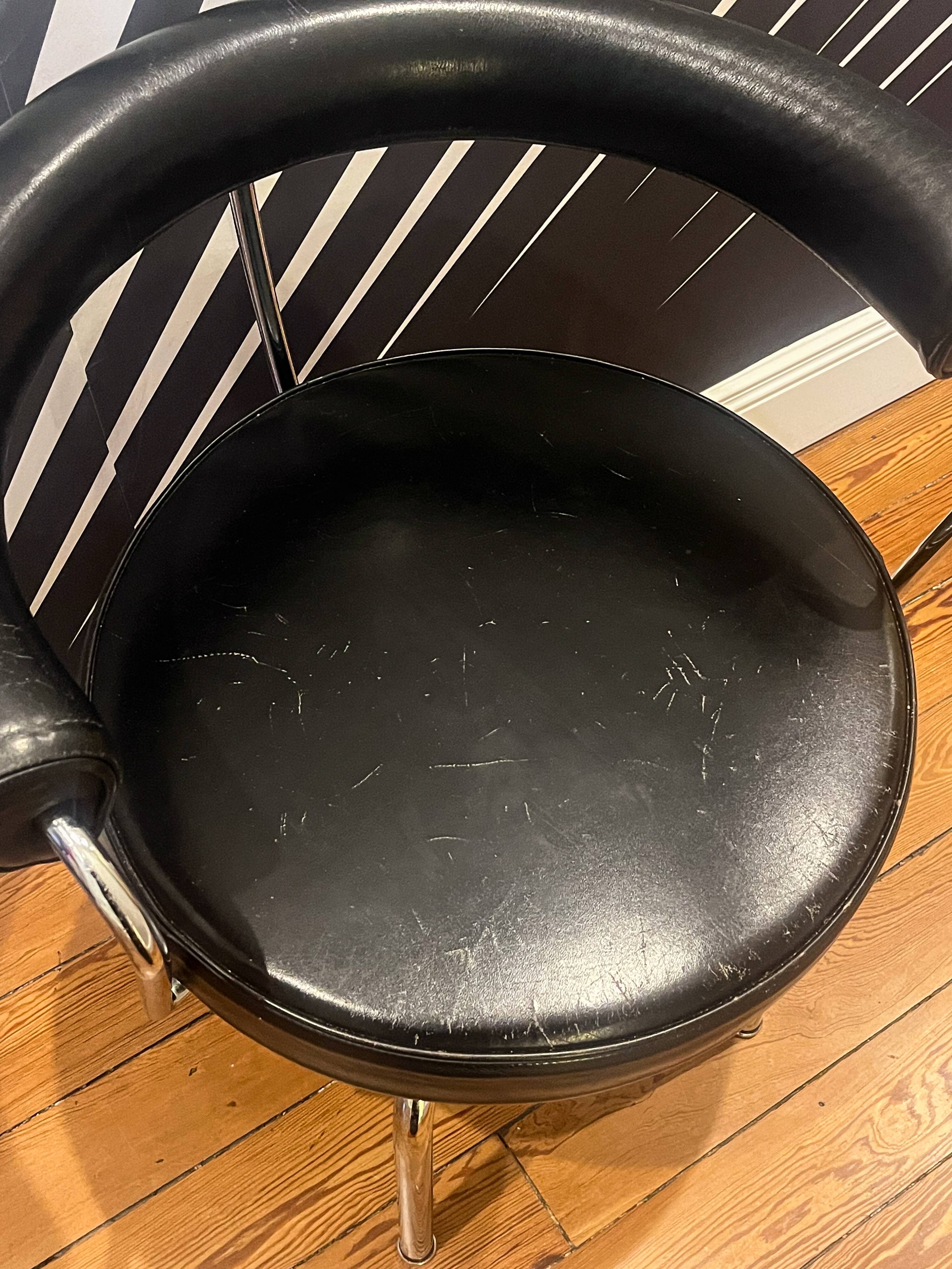 La Corbusier, Pair of LC7 armchairs, Cassina edition