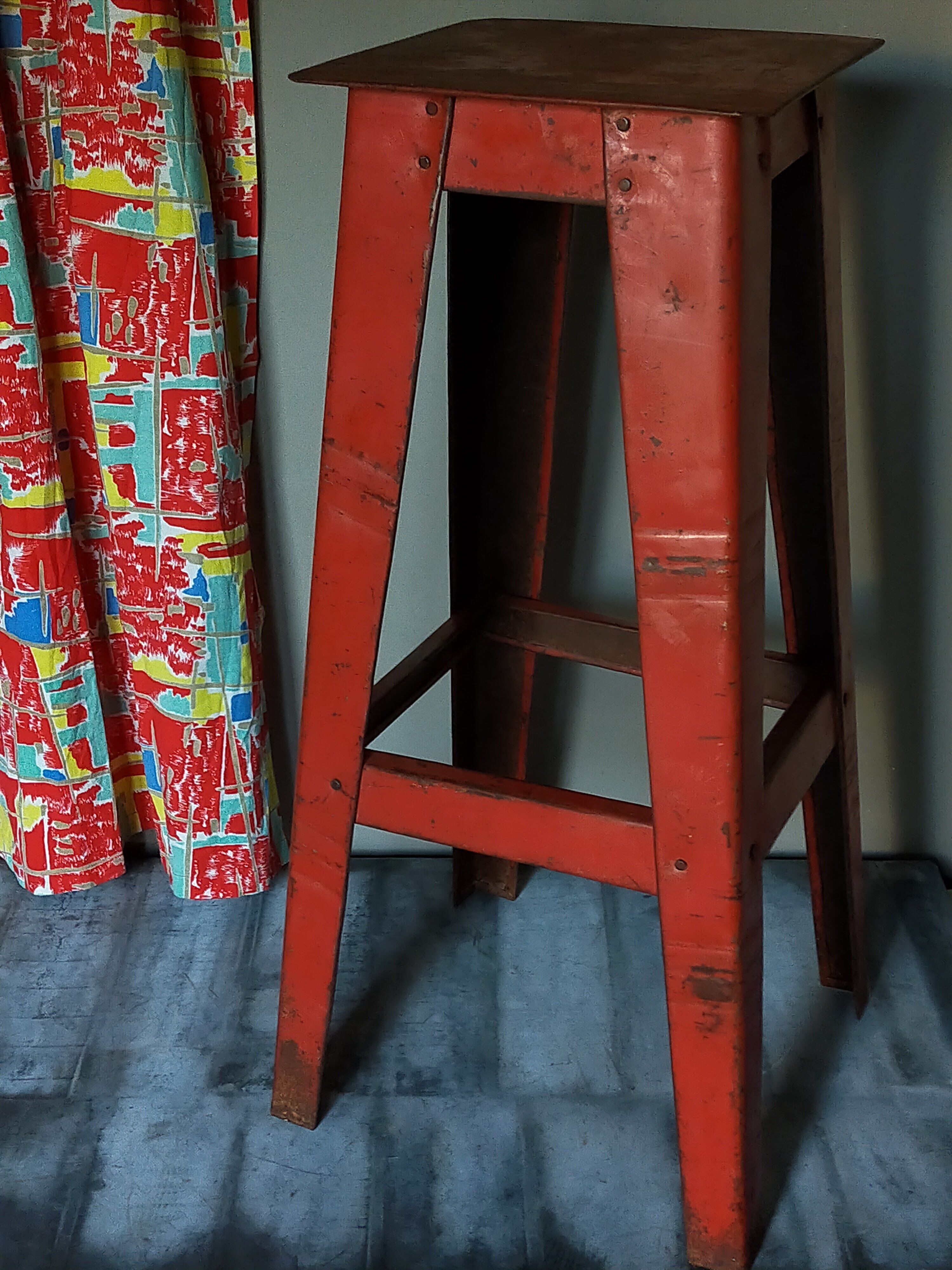 Vintage industrial stool made of recycled sheet metal