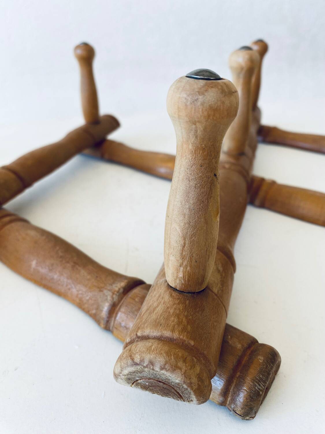 Old wooden wall coat rack