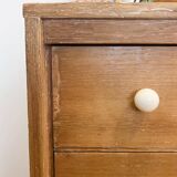 Vintage chest of drawers with round wooden handles