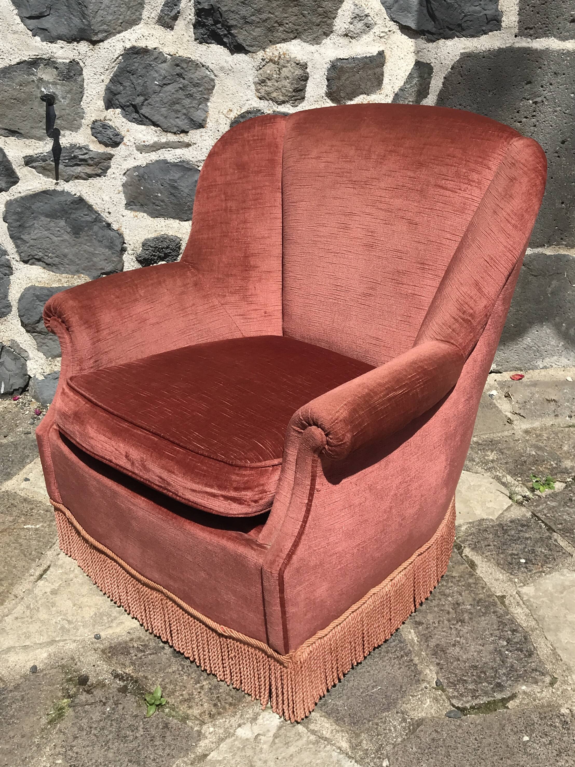 Vintage pink velvet armchair with fringes