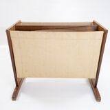 News paper rack in rosewood and canvas of danish design from the 1960s.