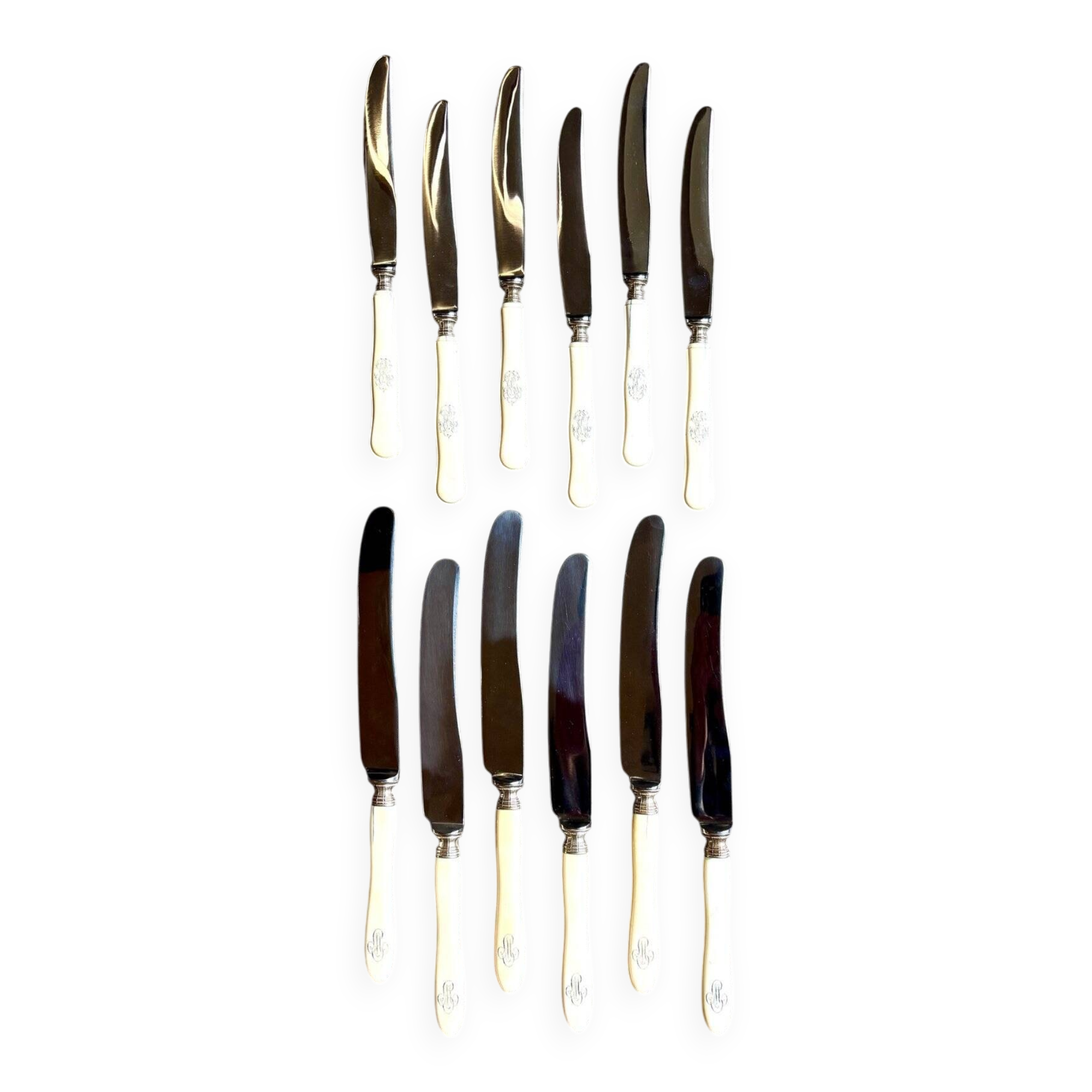 12 stainless steel and monogrammed bone knives