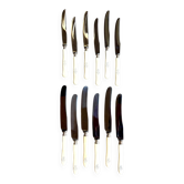 12 stainless steel and monogrammed bone knives
