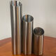 Vintage trio of brushed stainless steel candle holders