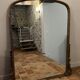 Large gilded mirror with pediment